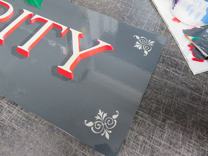 Hand lettering details on sign