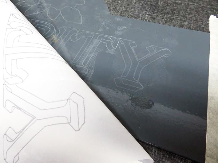 Peeling a corner of the drawing