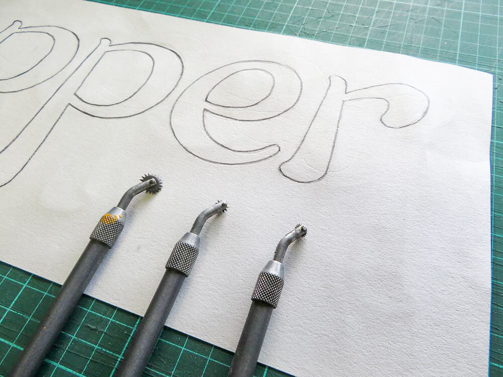 signwriting using pounce wheels