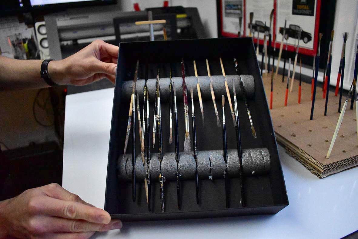 Brush storage for sign painters