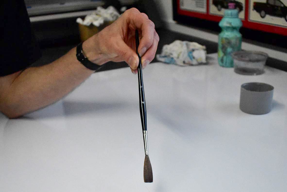 Wash a lettering brush